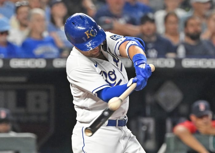 Jun 18, 2021; Kansas City, Missouri, USA; Kansas City Royals right fielder Whit Merrifield (15) hits an RBI double during the sixth inning against the Boston Red Sox at Kauffman Stadium. Mandatory Credit: Peter Aiken-USA TODAY Sports